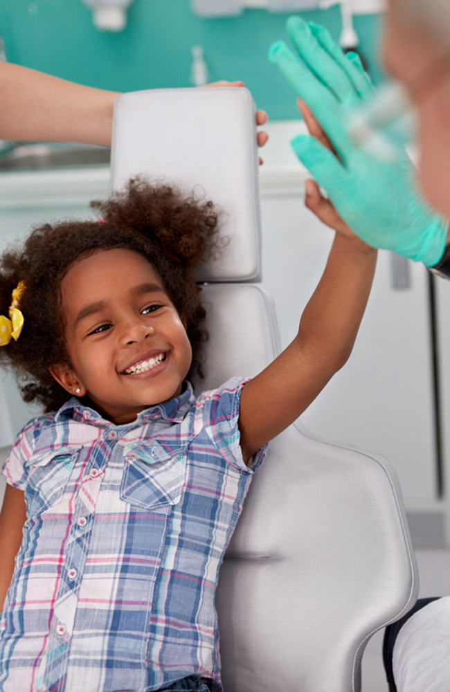 child in dentist chair